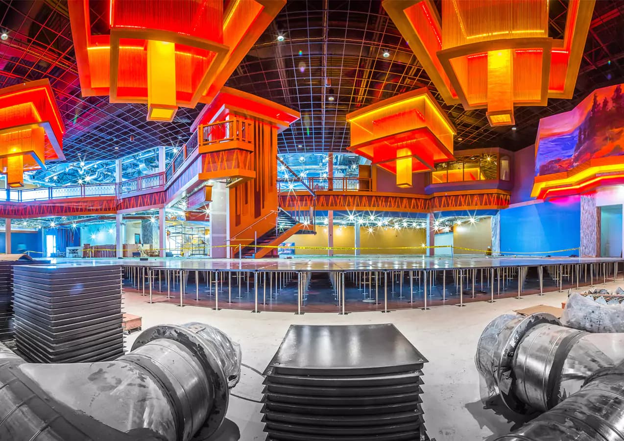 Commercial interior under construction with colourful light fixtures